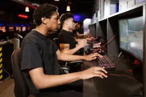 Player enjoying a computer game at a desk